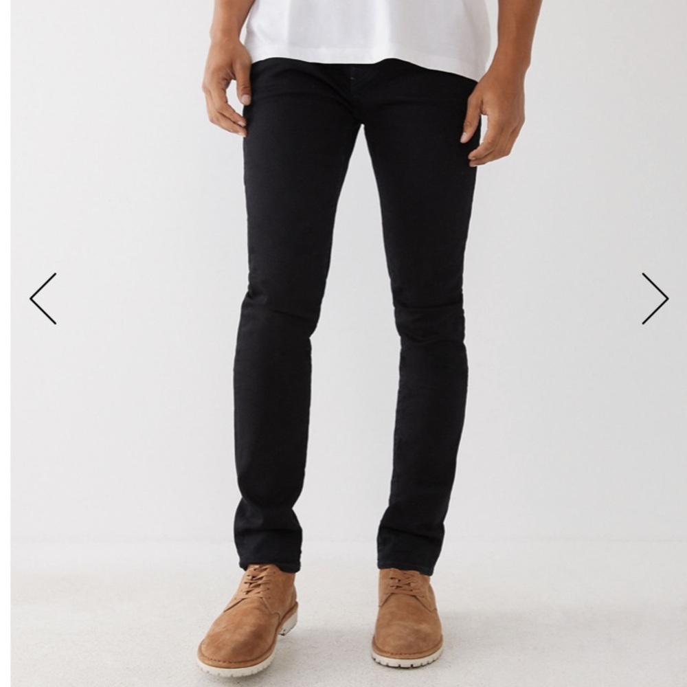 JACKSON cotton stretch skinny jeans. Zippered ankle detail.